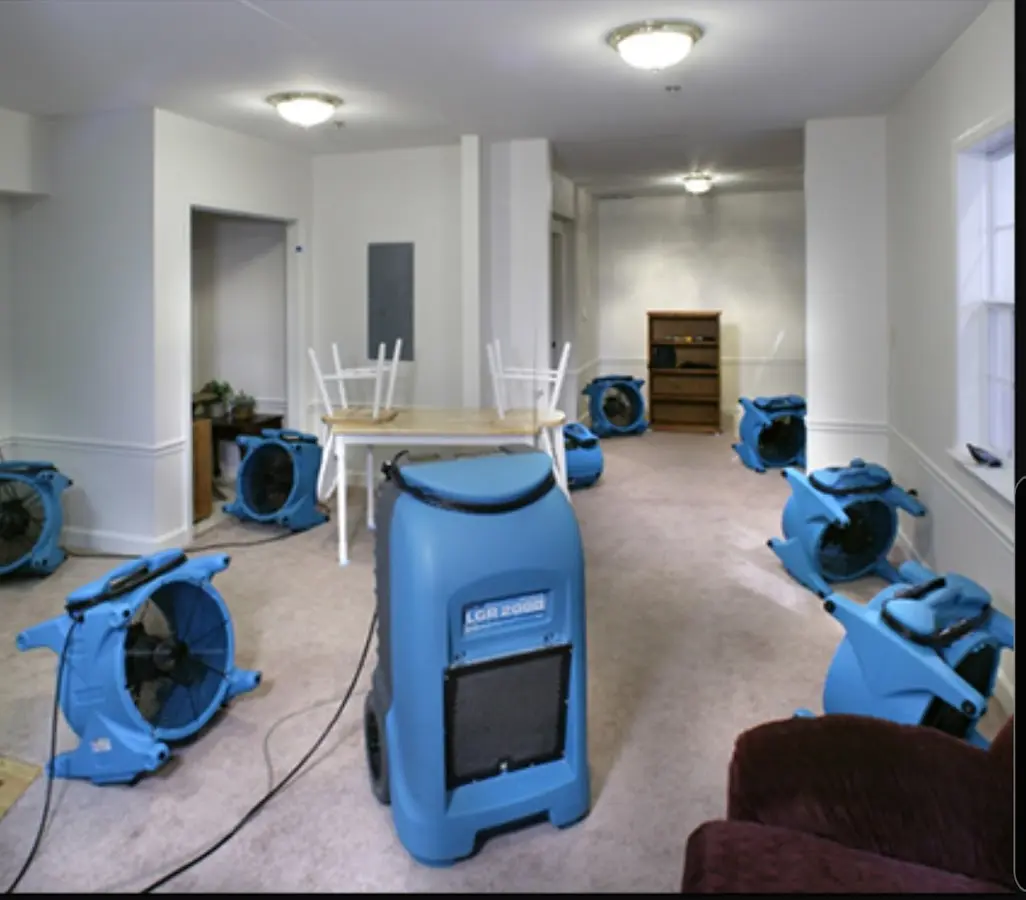 Air movers and dehumidifier setup for Water Damage Restoration in Allegan